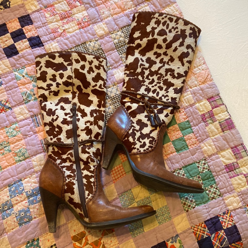Cow print heeled boots